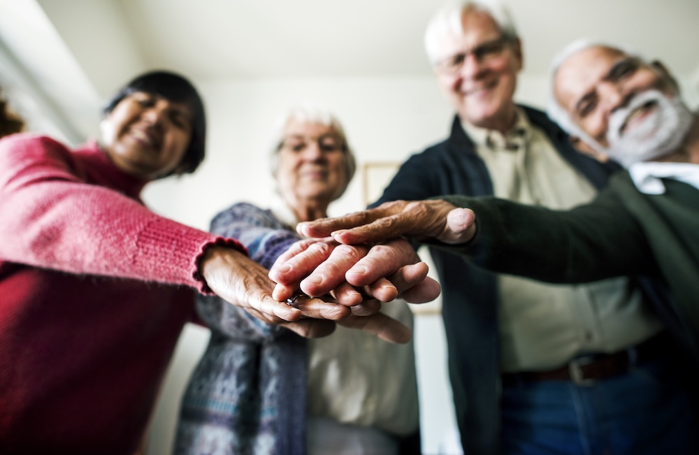 Group of senior friends support concept